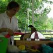 Carol Densmore demonstrating the drum carder